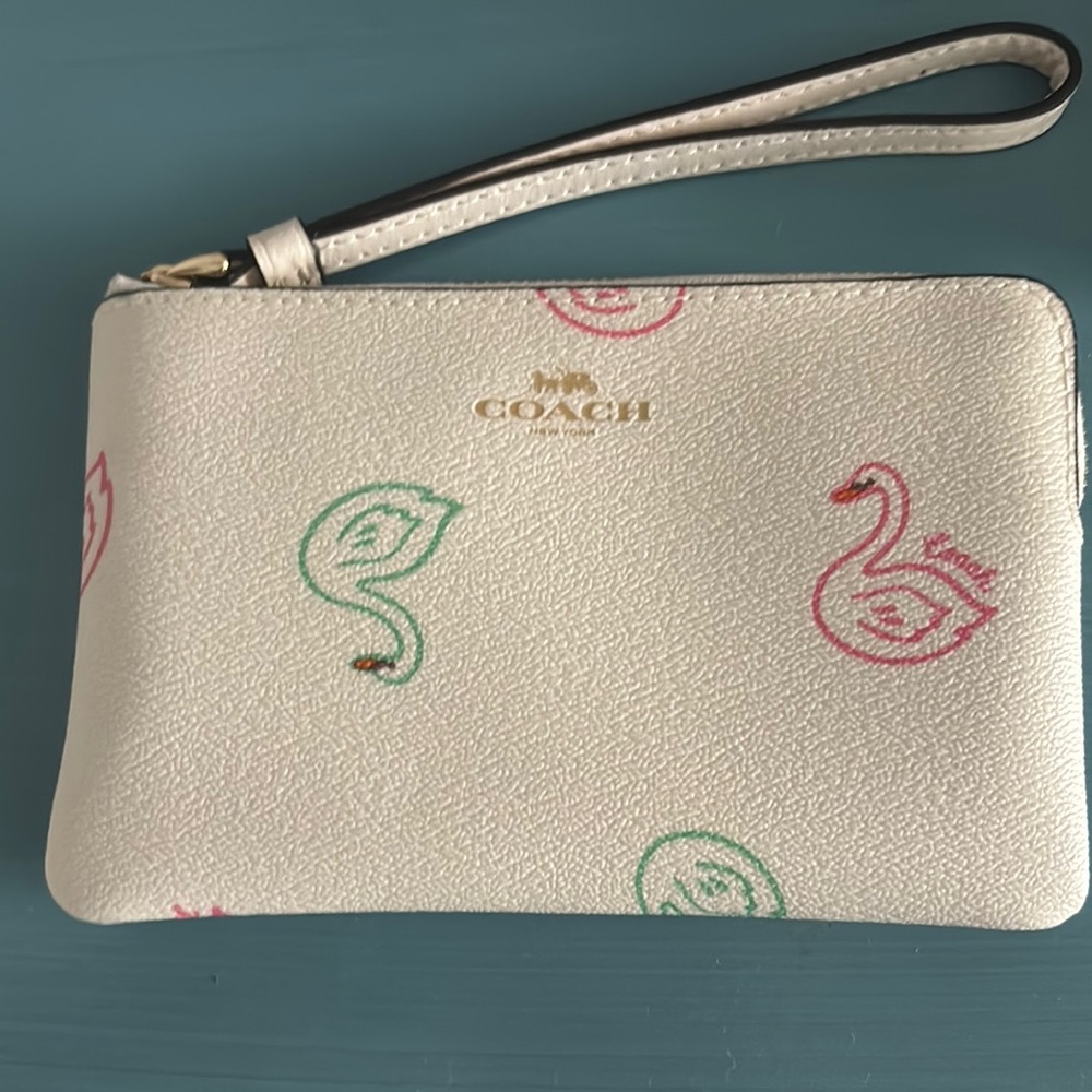 Coach White and Pink Wristlet with Swan Pattern